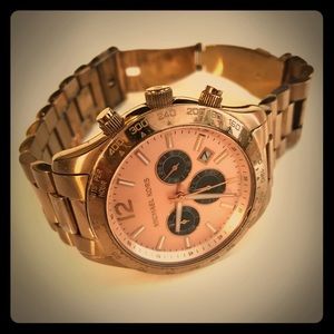 Women’s oversized rose gold Michael Kors watch